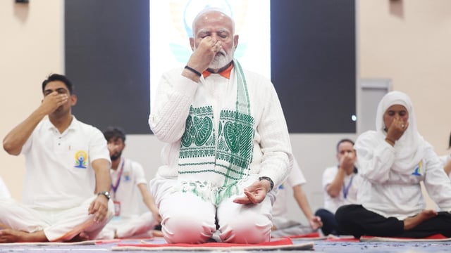 A photo of PM Modi participating in the 10th International Day of Yoga (2024) celebrations. 