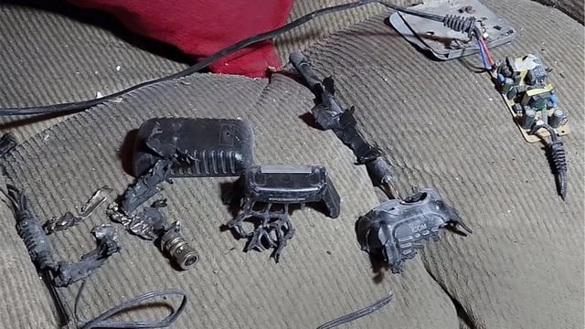 A walkie-talkie that was exploded inside a house, in Baalbek, east Lebanon, during the coordinated blasts in 2024 
