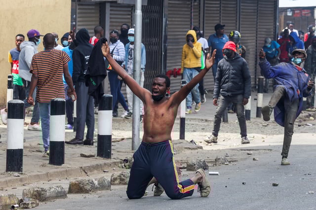 A man gestures, during a protest over the death of Kenyan blogger Albert Ojwang in police custody, in downtown Nairobi, Kenya June 17, 2025. REUTERS/Monicah Mwangi