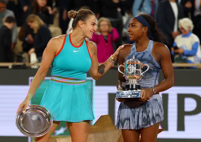 Tennis - French Open - Roland Garros, Paris, France - June 7, 2025 Tournament winner Coco Gauff of the U.S. and runner up Belarus' Aryna Sabalenka during the trophy presentation after their women's singles final match REUTERS/Lisi Niesner/File Photo