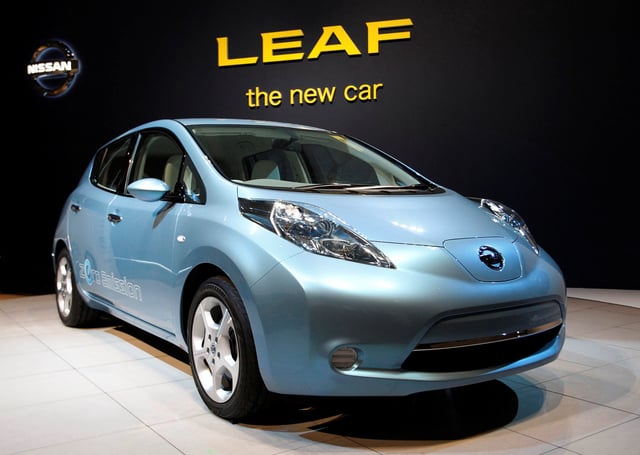 Nissan's Leaf all-electric vehicle is displayed at a news conference to announce the price tag for the world's first mass-produced electric car, at the company's global headquarters in Yokohama, south of Tokyo, March 30, 2010. REUTERS/Issei Kato/File Photo