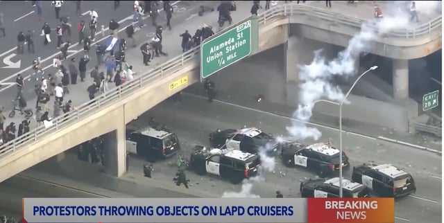 L.A. rioters destroy police cruisers in anti-ICE demonstrations.