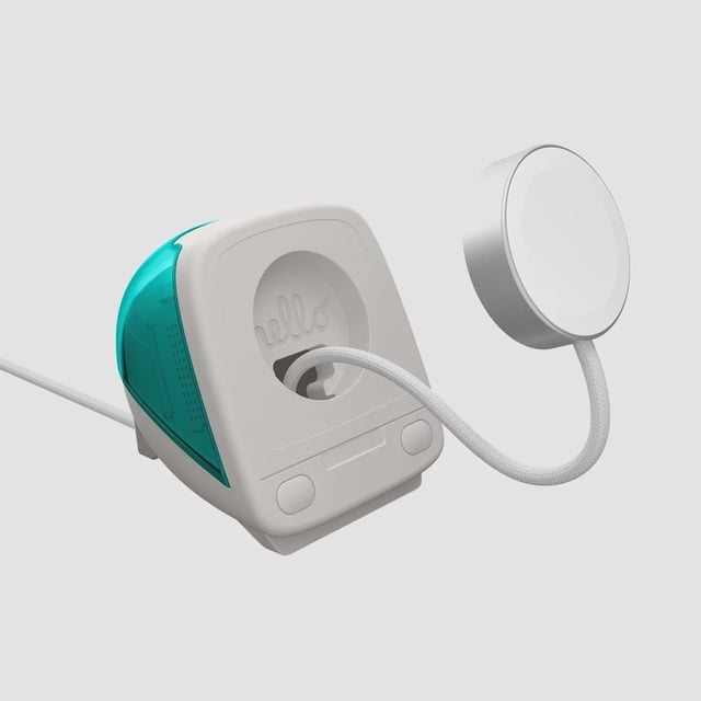 The Apple Watch charger, though not included, is easy to install in the little iMac G3 replica.