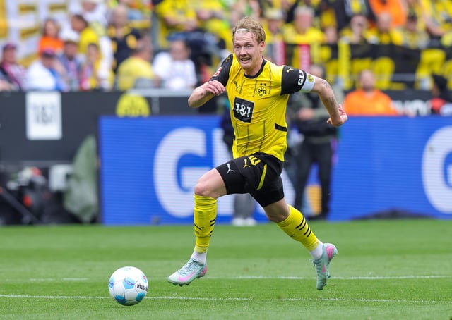Julian Brandt of Borussia Dortmund plays the ball during the Bundesliga match between Borussia Dortmund and Holstein Kiel at Signal Iduna Park on May 17, 2025 in Dortmund, Germany.