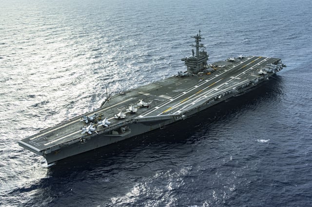 The United States Navy aircraft carrier USS George Washington transits the Philippine Sea on June 15, 2025.