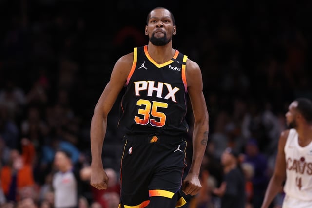 Kevin Durant #35 of the Phoenix Suns reacts after hitting a three point basket during the second half against the Cleveland Cavaliers at PHX Arena on March 21, 2025 in Phoenix, Arizona.