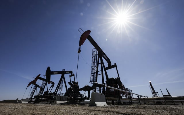 A pumpjack draws out oil and gas from a well head near Calgary, Alta., Tuesday, May 6, 2025. Canada has the third largest oil reserves in the world and is the world's fourth largest oil producer. THE CANADIAN PRESS/Jeff McIntosh