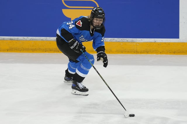 Jan 1, 2024; Toronto, Ontario, CANADA; Toronto forward Hannah Miller (34) carries the puck against New York during the second period of the inaugural PWHL ice hockey game at Mattamy Athletic Centre. Mandatory Credit: John E. Sokolowski-USA TODAY Sports/File Photo