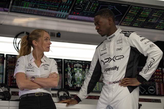 Apex tech director Kate (Kerry Condon) has a chat with hotshot rookie Joshua (Damson Idris) in "F1: The Movie."