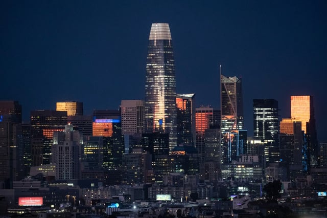 SAN FRANCISCO, CALIFORNIA – JANUARY 11, 2022: San Francisco’s downtown skyline, capped by the 61-story Salesforce Tower, catches the final warm rays of a winter sunset, Tuesday, Jan. 11, 2022. (Karl Mondon/Bay Area News Group)