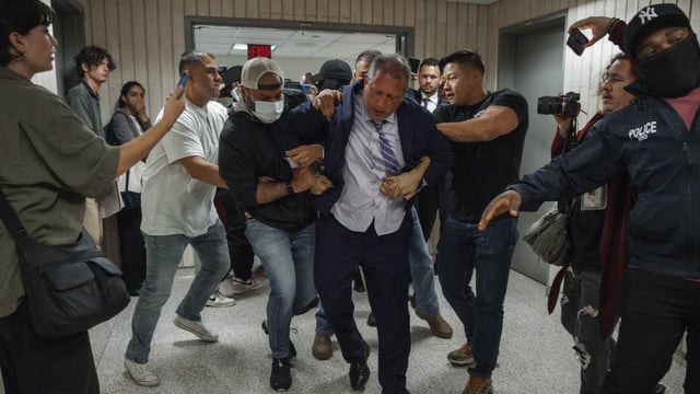 New York City Comptroller Brad Lander is placed under arrest by Immigration and Customs Enforcement (ICE) and FBI agents outside federal immigration court on Tuesday, June 17, 2025, in New York. (AP Photo/Olga Fedorova)