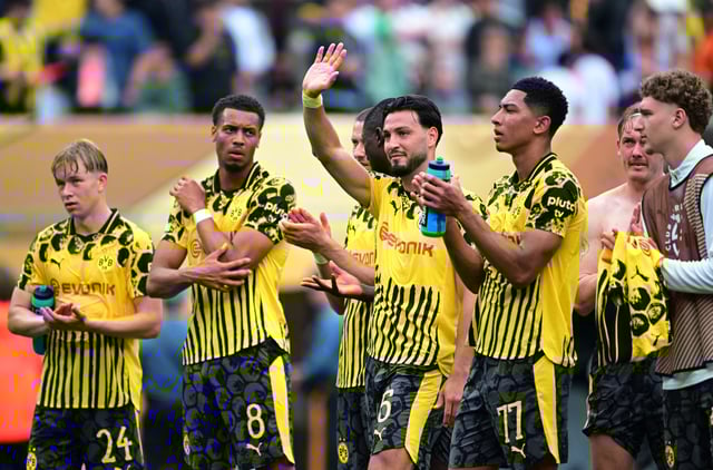 Soccer Football - FIFA Club World Cup - Group F - Fluminense v Borussia Dortmund - MetLife Stadium, East Rutherford, New Jersey, U.S. - June 17, 2025 Borussia Dortmund's Daniel Svensson, Borussia Dortmund's Felix Nmecha, Borussia Dortmund's Ramy Bensebaini and Borussia Dortmund's Jobe Bellingham react after the match IMAGN IMAGES via Reuters/Mark Smith