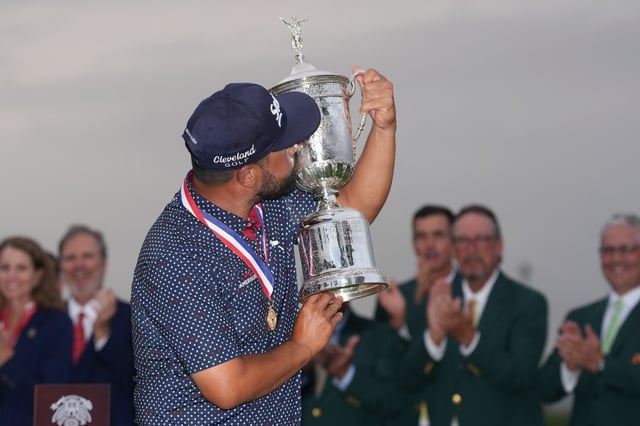 J.J. Spaun celebrates with the trophy after winning the U.S. Open golf tournament at Oakmont Country Club Sunday, June 15, 2025, in Oakmont, Pa. (AP Photo/Seth Wenig)