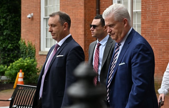 Matthew Schlegel defense attorneys Patrick Seidel, left,  Peter O’Neill, right, and Andrew Harvey, leave the Anne Arundel County Circuit Courthouse Tuesday, during a lunch break. (Paul W. Gillespie/Staff)