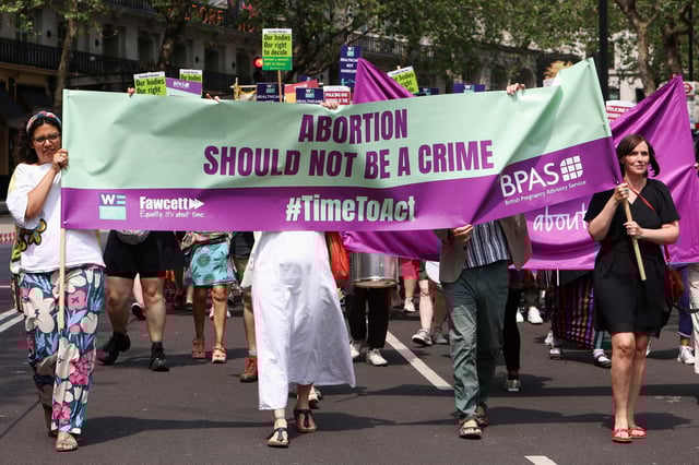 People march during a protest calling for abortion law reform in London, Britain June 17, 2023. REUTERS/Susannah Ireland/File Photo