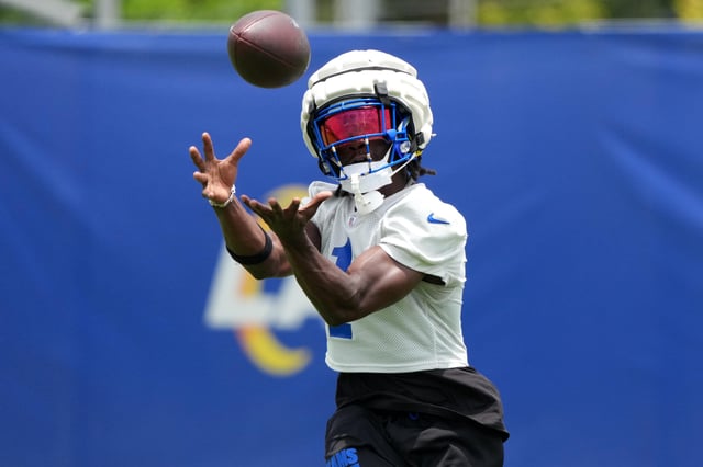 Jun 3, 2025; Woodland Hills, CA, USA; Los Angeles Rams cornerback Derion Kendrick (1) catches the ball during organized team activities at Rams Practice Facility. Mandatory Credit: Kirby Lee-Imagn Images/File Photo