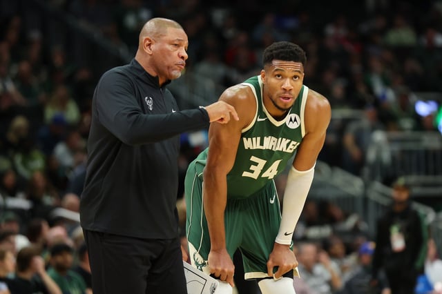 Giannis Antetokounmpo #34 of the Milwaukee Bucks speaks with head coach Doc Rivers during the second half of a game against the Chicago Bulls at Fiserv Forum on October 25, 2024 in Milwaukee, Wisconsin.