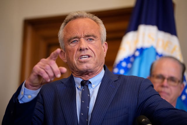 Health and Human Services Secretary Robert F. Kennedy Jr., pictured above, is reportedly looking at a pair of policies that would exacerbate broadcasters' financial woes.