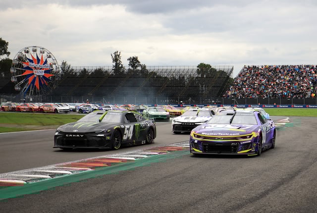 Ty Gibbs, driver of the #54 Monster Energy Toyota, and Shane Van Gisbergen, driver of the #88 Safety Culture Chevrolet, lead the field during the NASCAR Cup Series Viva Mexico 250 at Autodromo Hermanos Rodriguez on June 15, 2025 in Mexico City, Mexico.