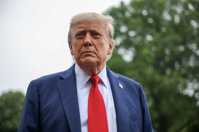 President Donald Trump can be seen stopping to talk to the media before boarding Marine One on the South Lawn at the White House on June 15, 2025, in Washington, DC. (Photo by Tasos Katopodis/Getty Images)
