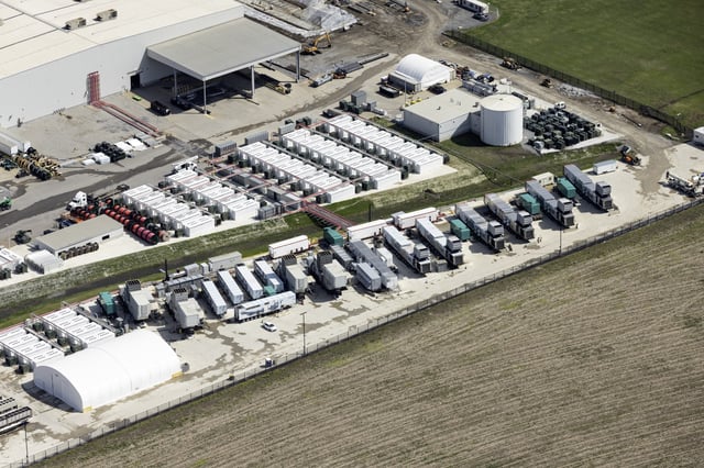 An aerial view of the xAI Colossus data center in Memphis, Tennessee, shows some of the mobile gas-fired generators used to power the supercomputer. A lawsuit on behalf of the NAACP claims the turbines are polluting the nearby residents and that Elon Musk&#39;s company lacks air quality permits.