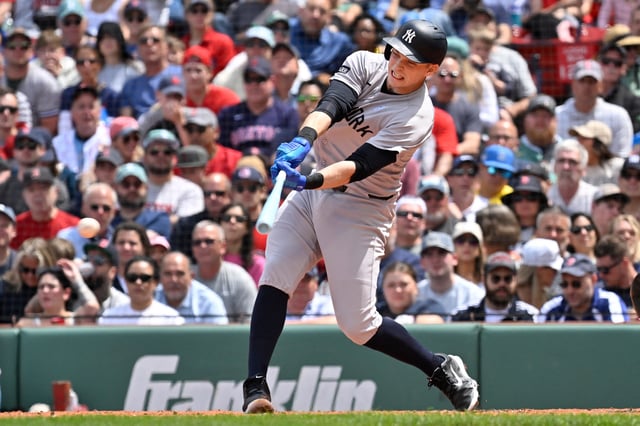 Jun 15, 2025; Boston, Massachusetts, USA; New York Yankees first baseman Ben Rice (22) gets a base hit against the Boston Red Sox during the third inning at Fenway Park. Mandatory Credit: Eric Canha-Imagn Images/File Photo