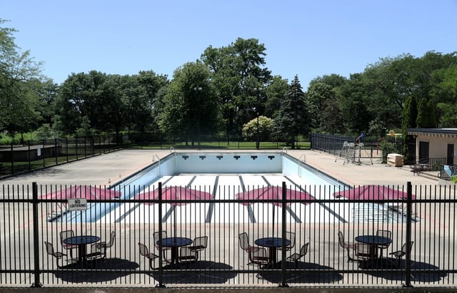 The pool at River Park was closed on June 16, 2022, in Chicago. The city has struggled with lifeguard shortages for years post-pandemic, prompting the closure of dozens of pools and several beaches. Others operated on limited hours or shortened seasons — last year, Chicago’s outdoor pools were only open six days a week.(John J. Kim/Chicago Tribune)