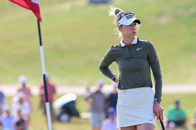 Jun 1, 2025; Erin, Wisconsin, USA; Nelly Korda looks on at the 18th green during the final round of the U.S. Women's Open golf tournament. Mandatory Credit: Benny Sieu-Imagn Images/File Photo