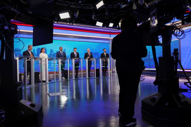 Democratic mayoral candidates Brad Lander, Jessica Ramos, Zellnor Myrie, Andrew Cuomo, Whitney Tilson and Zohran Mamdani participate in a Democratic mayoral primary debate, June 4, 2025, in New York, U.S.  Yuki Iwamura/Pool via REUTERS