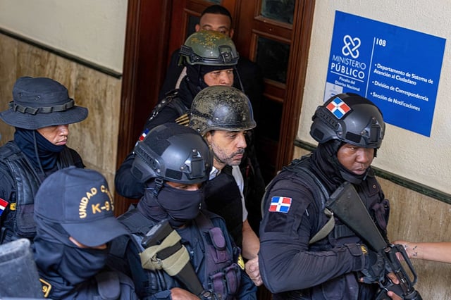Members of special police forces take businessman Antonio Espaillat into custody in Santo Domingo on June 15, 2025.  