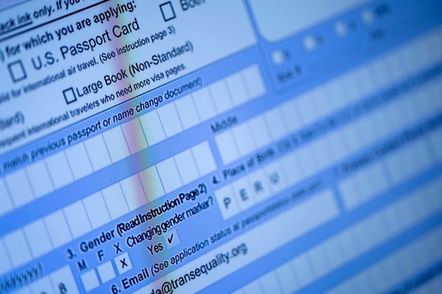 A partially completed passport application, with an X gender marker, is seen on a computer monitor in Alexandria, Virginia, on April 11, 2022.