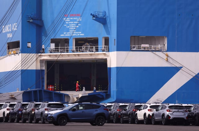 Newly manufactured cars awaiting export are parked at a port in Yokohama, south of Tokyo, Japan March 27, 2025. REUTERS/Issei Kato/File Photo