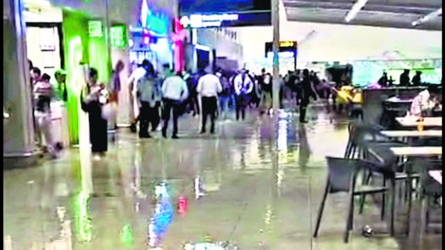 A videograb of a flooded food court at Terminal 1 of the Indira Gandhi International Airport after heavy rainfall, in New Delhi on Tuesday. (PTI)