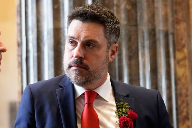 FILE - Republican state senator Blake Miguez converses before the swearing in of the Louisiana state legislature in Baton Rouge, La., on Jan. 8, 2024. (AP Photo/Gerald Herbert, Pool, File)