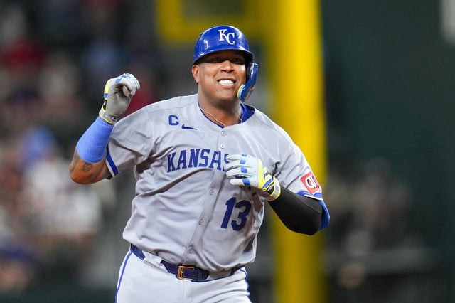 Kansas City Royals' Salvador Perez reacts after hitting a solo home run off Texas Rangers starting pitcher Jack Leiter during the sixth inning of a baseball game Tuesday, June 17, 2025, in Arlington, Texas. (AP Photo/Julio Cortez)