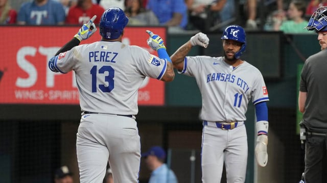 Kansas City Royals catcher Salvador Perez (13) celebrates his two-run home run with third baseman Maikel Garcia (11) against the Texas Rangers during the first inning at Globe Life Field on June 17, 2025.