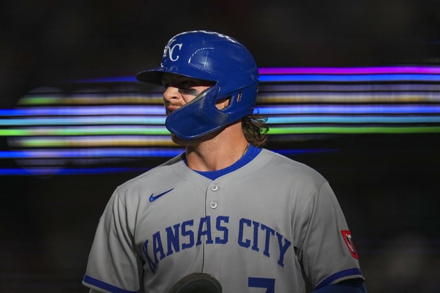 Kansas City Royals' Bobby Witt Jr. returns to the dugout after scoring on a single by Maikel Garcia during the first inning of a baseball game against the Texas Rangers Tuesday, June 17, 2025, in Arlington, Texas. (AP Photo/Julio Cortez)