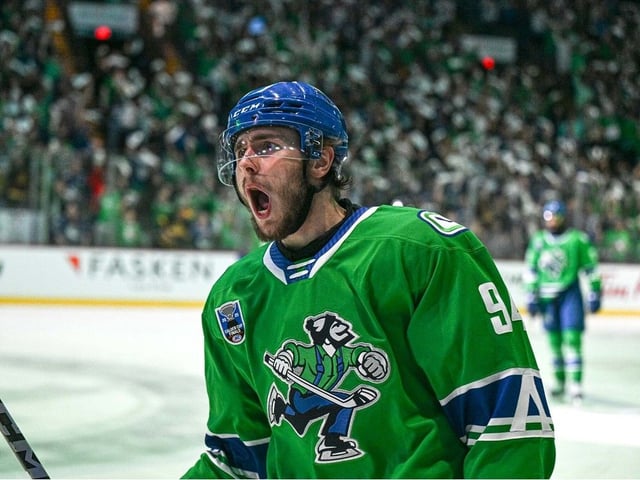  Linus Karlsson celebrates his third-period goal against the Charlotte Checkers on Tuesday at the Abbotsford Centre.