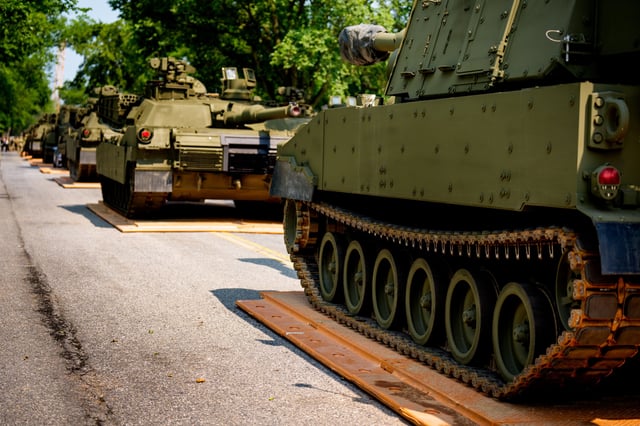 U.S. Army soldiers work on an assortment of M1 Alpha a3 Abrams tanks, stryker armored vehicles, and M2 Bradley fighting vehicles at West Potomac Park along the Potomac River on June 11, 2025 in Washington, DC.