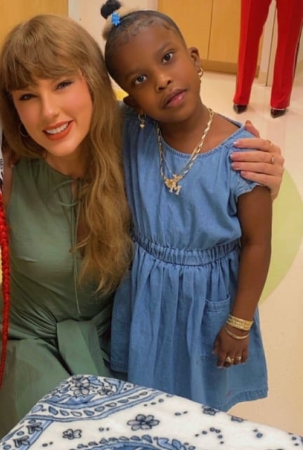 Majesty Williams, 7, poses with Taylor Swift at Joe DiMaggio Children's Hospital in Hollywood, Florida, June 13, 2025.