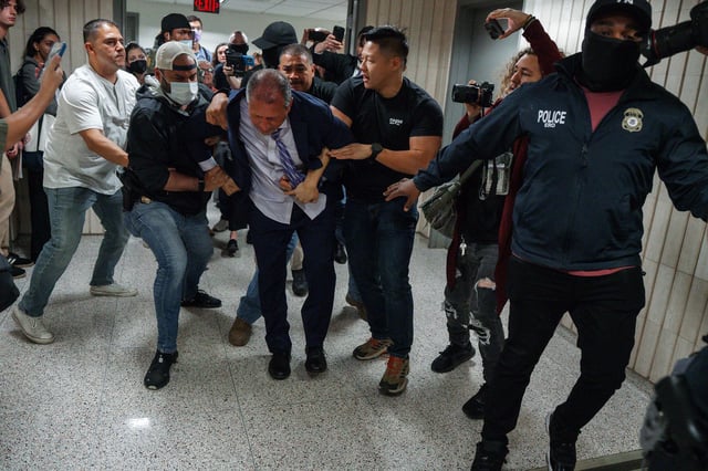 New York City Comptroller Brad Lander is placed under arrest by Immigration and Customs Enforcement and FBI agents outside federal immigration court in New York, on Tuesday, June 17, 2025.