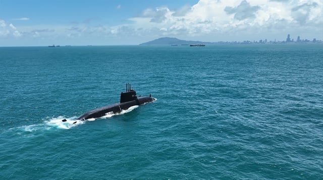 Taiwan&#39;s indigenous submarine Narwhal conducts floating navigation tests in Kaohsiung Harbor on June 17, 2025.
