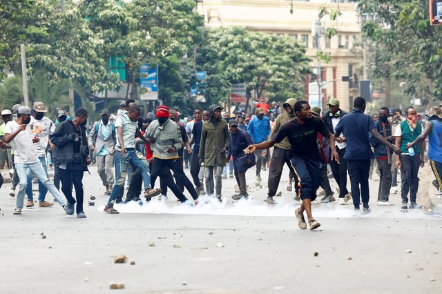 A protester throws a projectile during a demonstration over the death of Kenyan blogger Albert Ojwang in police custody, in downtown Nairobi, Kenya June 17, 2025. REUTERS/Thomas Mukoya/File photo