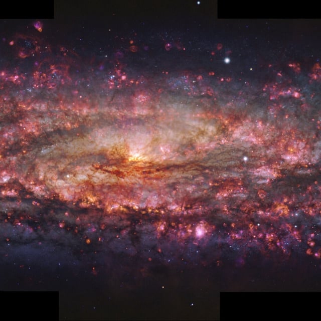 An image of the Sculptor Galaxy created using images from the European Southern Observatory’s Very Large Telescope.