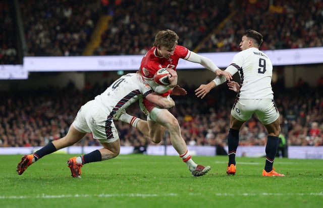 Rugby Union - Six Nations Championship - Wales v England - Millennium Stadium, Cardiff, Wales, Britain - March 15, 2025 Wales' Ellis Mee England's Fin Smith and Alex Mitchell Action Images via Reuters/Paul Childs