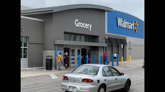 The grocery entrance to the Walmart Supercenter at 3200 NW 79th St. in Miami on Sunday, May 7, 2023.