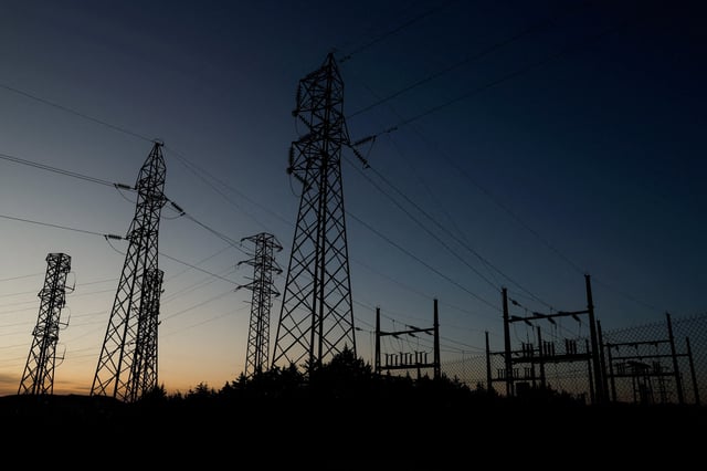 Power lines connecting pylons of high-tension electricity are seen during sunset at an electricity substation on the outskirts of Ronda, during a blackout in the city, Spain April 28, 2025. REUTERS/Jon Nazca/File Photo