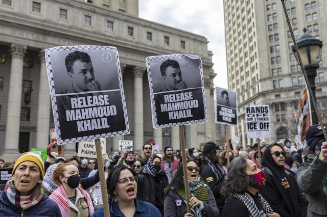 A crowd gathers outside the Manhattan federal court in support of Mahmoud Khalil, Wednesday, March 12, 2025, in New York. 