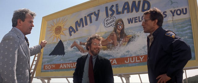 Murray Hamilton, left, Richard Dreyfuss and Roy Scheider in a classic scene from "Jaws," which turns 50 in 2025. For many fans, the movie's themes go well beyond a simple fear of ocean predators.