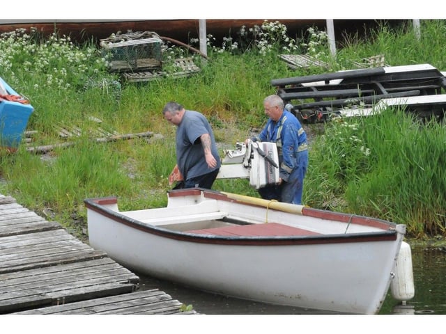  Fishermen in the Quidi Vidi Gut get their boat ready for the beginning of the 2024 recreational food fishery.